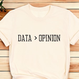 May include A white t shirt with the text DATA OPI