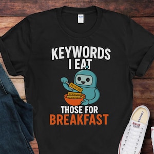 May include Black t shirt with the text KEYWORDS I