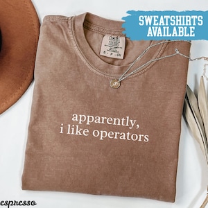 May include Espresso colored t shirt with the phra